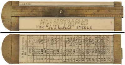 Unmarked: Ivory Metric/English Caliper Rule