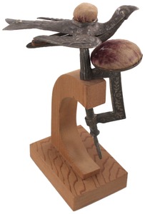 Unmarked: Early Pressed Tin "Sewing Bird"