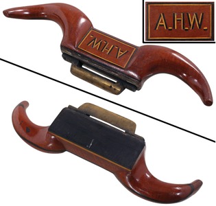 Unmarked: Laminated "Ram's Horn" Scraper