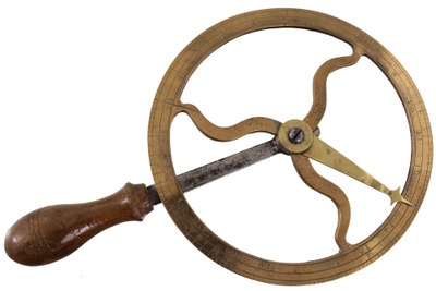 Unmarked: Early Solid Brass Wheel Traveler