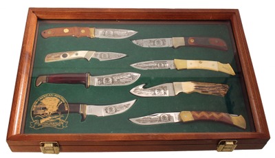 North American Hunting Club: Display Set Of Eight Engraved Knives