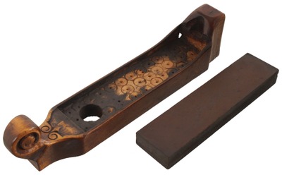 Unmarked: Early Scroll Carved Slipstone Holder