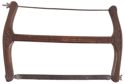 Unmarked: Early Carved Walnut Frame Saw