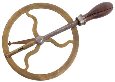 Unmarked: Early Solid Brass Wheel Traveler