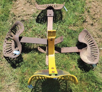 Assorted Makers: Four Cast Iron Tractor Seats