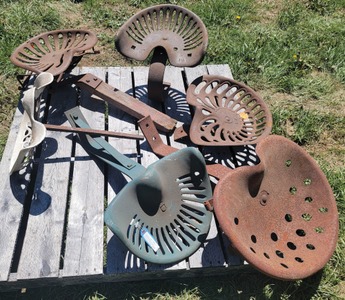 Assorted Makers: Six Cast Iron Tractor Seats