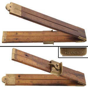 Unmarked: Unus. Brass Cam Lock Rule Attachment