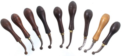 C.S. Osborne & Company, Newark, New Jersey: Stepped Set Of 9 Leather Wkrs. Tracin